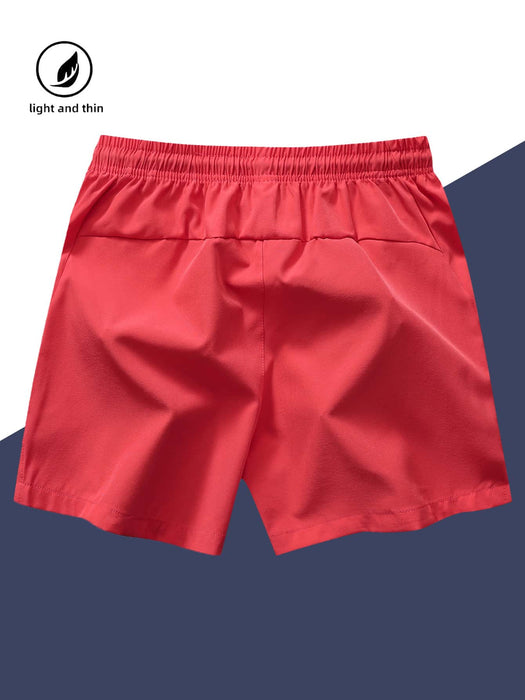 SHEIN Pantalones cortos deportivos de 3/4 para hombre con bolsillo con cremallera