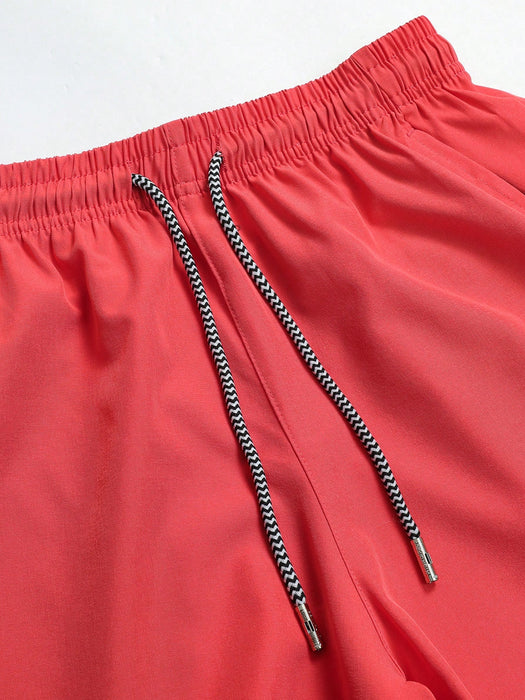 SHEIN Pantalones cortos deportivos de 3/4 para hombre con bolsillo con cremallera