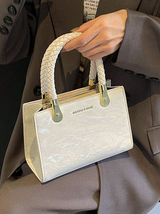 SHEIN Mini bolso de mano elegante de piel sintética con asa tejida para mujer.