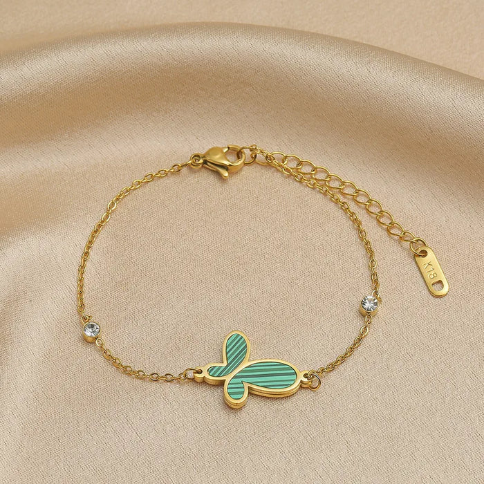Pulsera de eslabones con diseño de mariposa en color verde y tono dorado para mujer