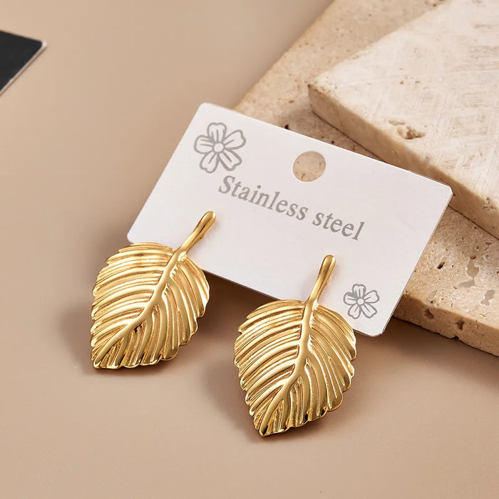 Pendientes de acero inoxidable estilo casual y moderno con forma de hoja