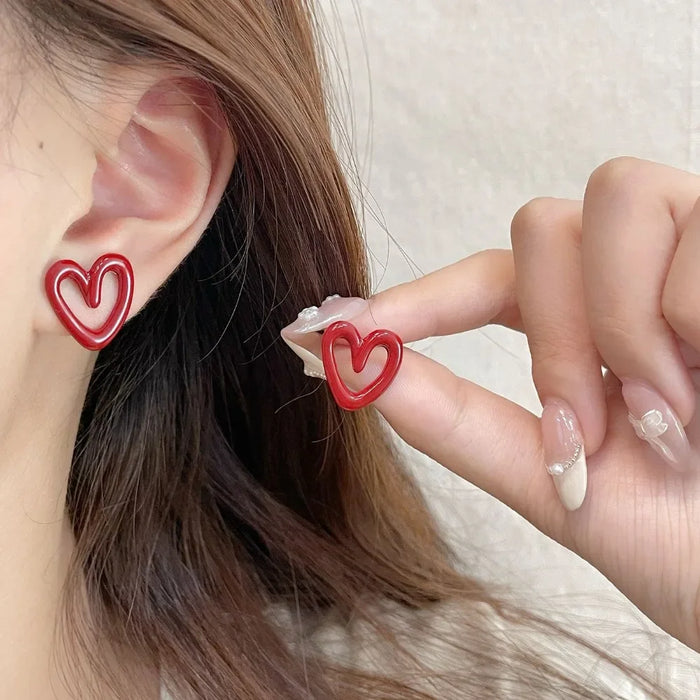Pendientes Ankela rojos de boton con forma de corazon