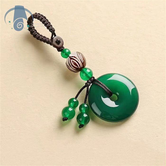 Llavero con botón de la paz con colgante de loto Bodhi de jade