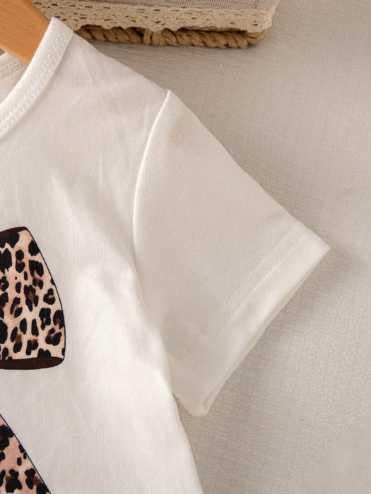 SHEIN Conjunto de camiseta y pantalón ancho con estampado de leopardo para niñas