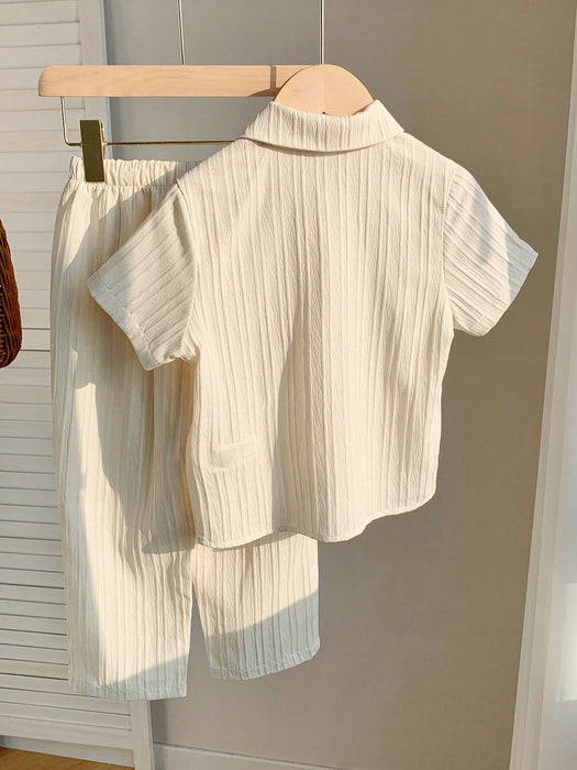 SHEIN Conjunto de camisa  y pantalón con estampado de rayas onduladas para niños