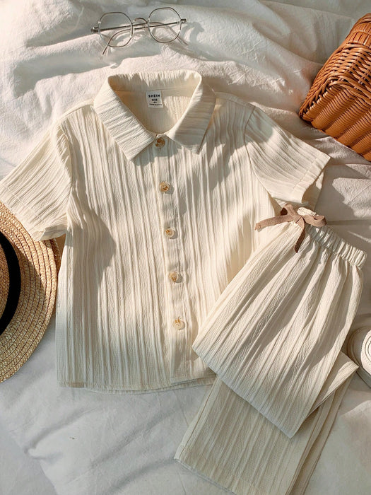 SHEIN Conjunto de camisa  y pantalón con estampado de rayas onduladas para niños