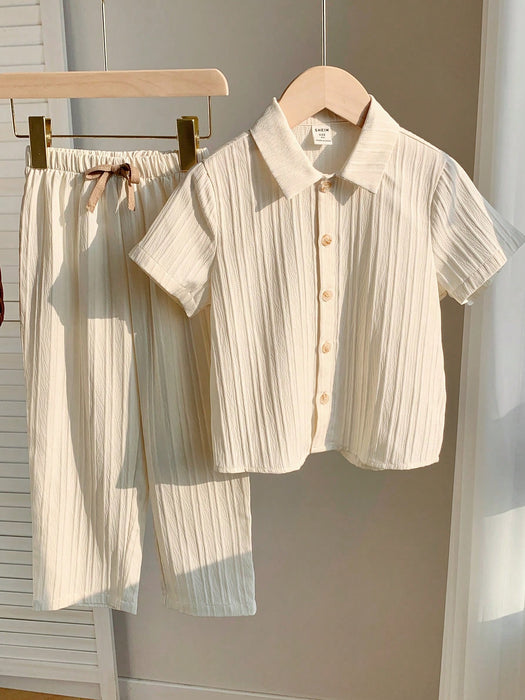 SHEIN Conjunto de camisa  y pantalón con estampado de rayas onduladas para niños