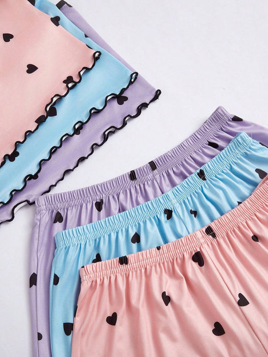 SHEIN Conjunto de pijama de 3 piezas para mujer: camisola y shorts con estampado de corazones.