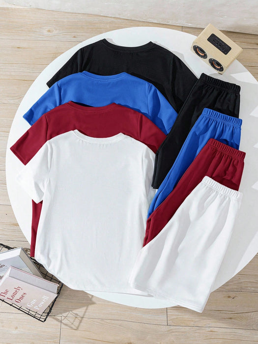 SHEIN Conjunto de 8 piezas para preadolescentes: camiseta de cuello redondo y pantalones cortos