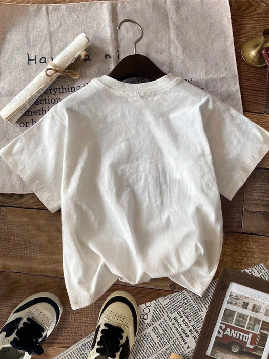 SHEIN Camiseta casual con estampado de perro lindo para niños, con bolsillo falso