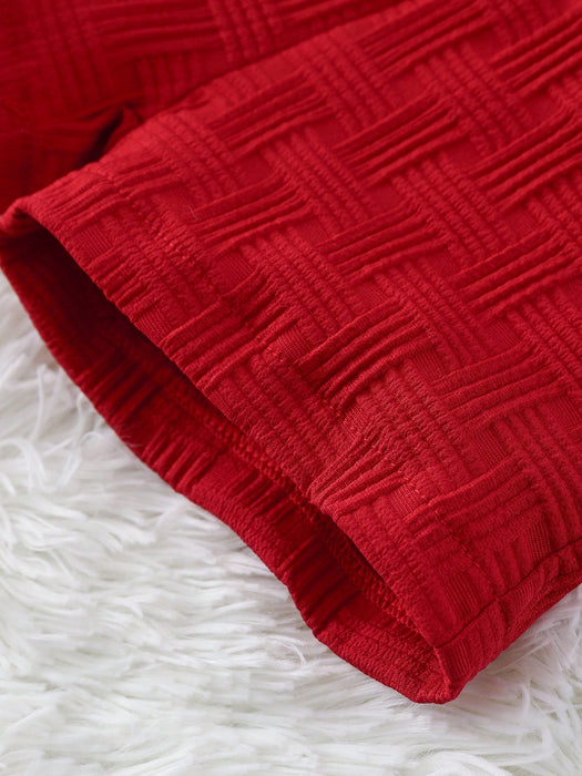 SHEIN Conjunto de camisa y pantalones cortos texturizados para niños