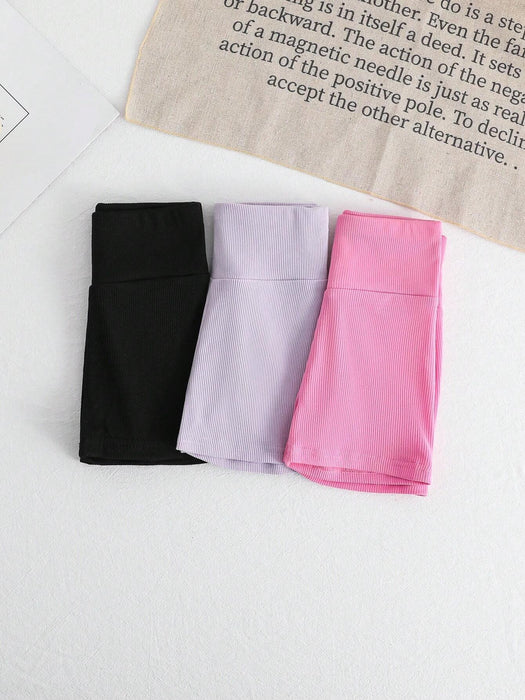 SHEIN Conjunto de shorts de punto de unicolor de cintura alta fresco y deportivo para niña