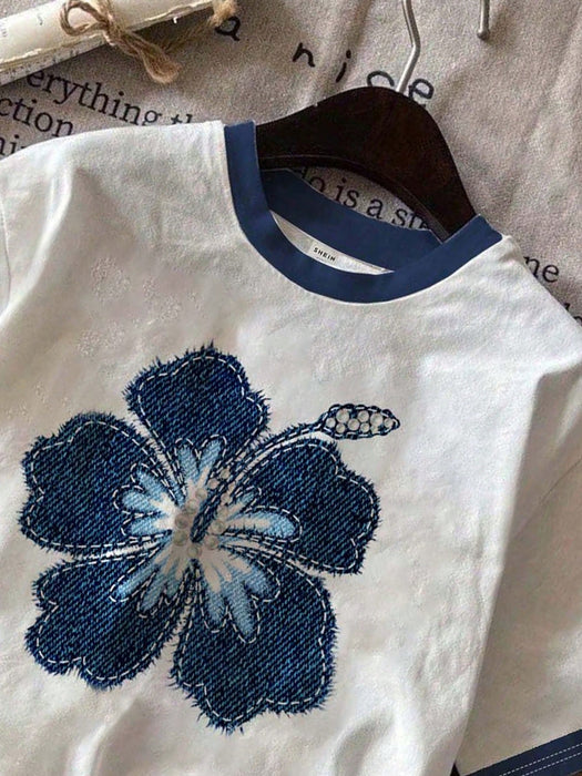 SHEIN EZwear Camiseta de ajuste holgado, estampado floral azul y estilo minimalista