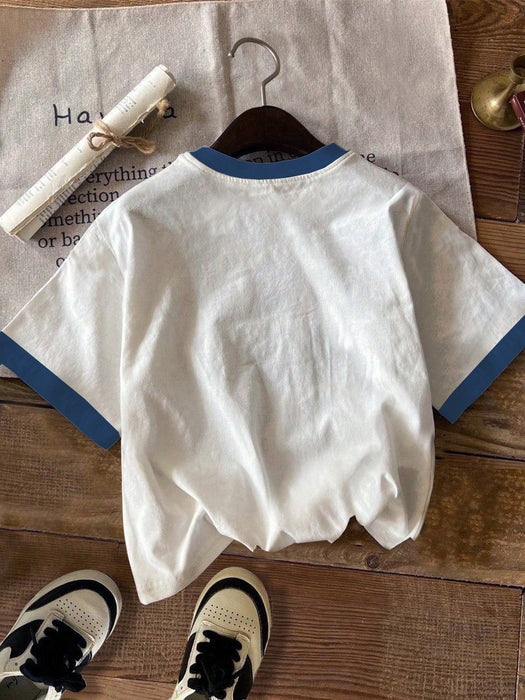 SHEIN EZwear Camiseta de ajuste holgado, estampado floral azul y estilo minimalista