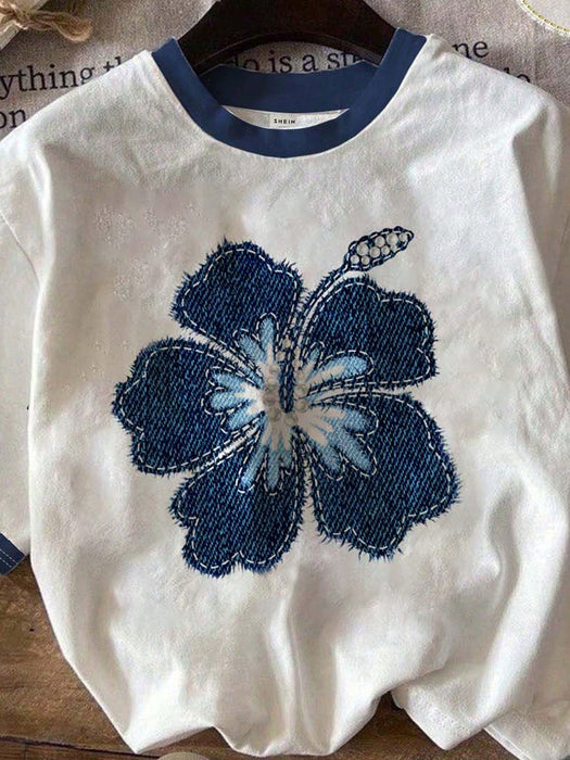 SHEIN EZwear Camiseta de ajuste holgado, estampado floral azul y estilo minimalista