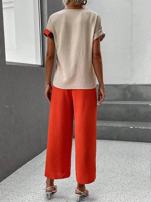 SHEIN LUNE Top de manga murciélago con estampado geométrico y pantalones de pernera ancha