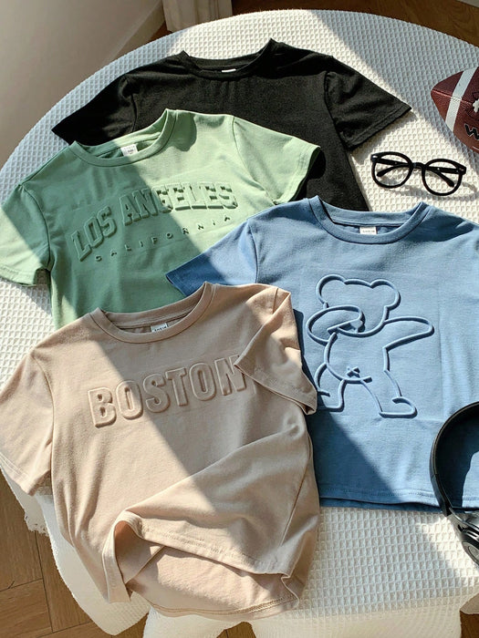 SHEIN 4 camisetas de manga corta con estampado de letras en relieve para niños