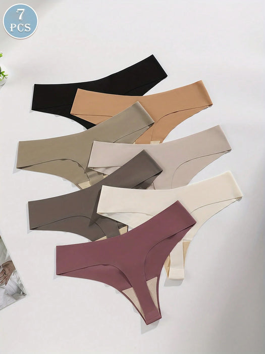 SHEIN SQPVEH Paquete de 7 bragas tanga sexys de color liso para mujer