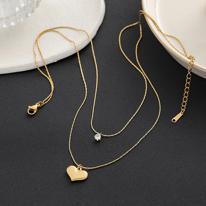 Collar con colgante de corazón de doble capa de acero inoxidable