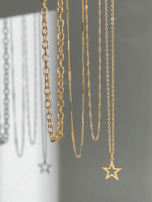 Shein Goth 4 piezas Conjunto de joyas con collar de cadena con colgante de estrella estilo punk dorado de moda