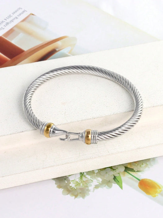 Brazalete de acero inoxidable con forma de gancho y cable retorcido