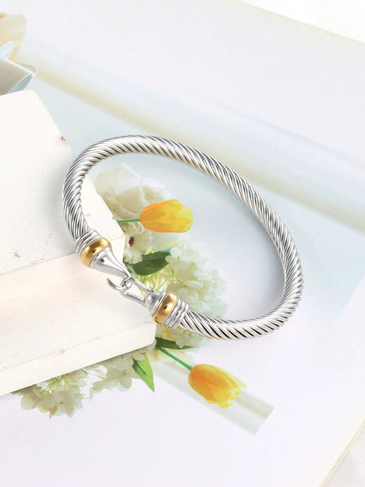 Brazalete de acero inoxidable con forma de gancho y cable retorcido