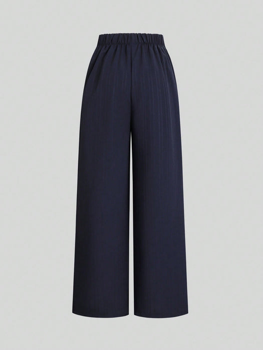 SHEIN Pantalones negros de pierna ancha con detalle de botones y rayas verticales