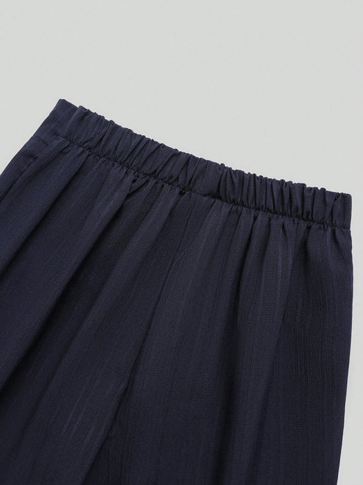 SHEIN Pantalones negros de pierna ancha con detalle de botones y rayas verticales