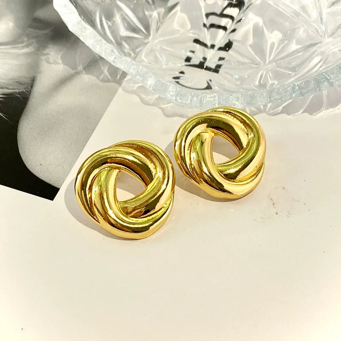 Pendientes de botón circulares con diseño retorcido para mujer, de cobre