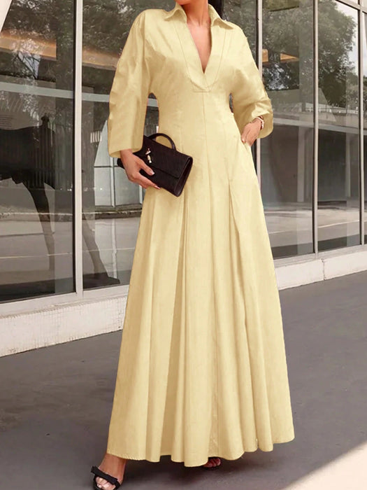 Vestido largo elegante de mujer con cuello en V con manga larga y bajo acampanado
