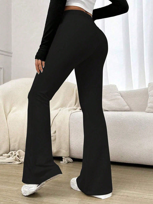 SHEIN Pantalones deportivos de yoga acampanados de cintura alta y color liso para mujer