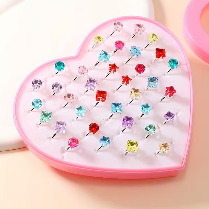 Set de joyería de 5 anillos plateados de imitación con diseños aleatorios