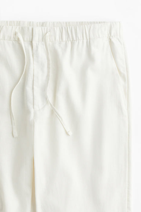 Pantalones de corte regular de mezcla de lino H&M-Blanco