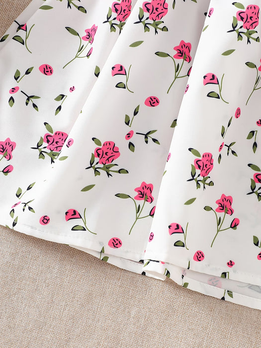 Vestido para niñas con estampado floral, detalle de lazo y borde festoneado, manga abullonada