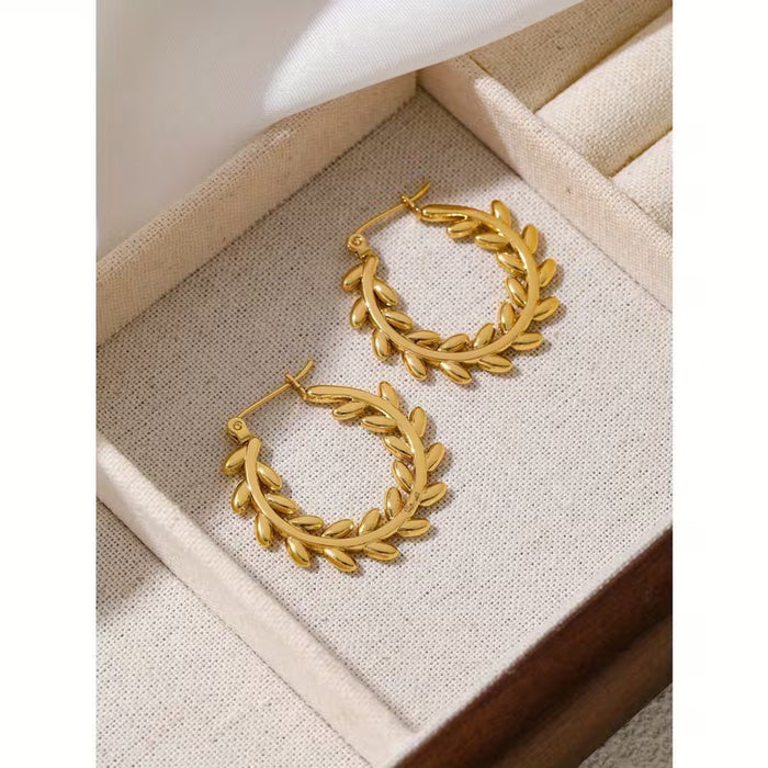 1 Par de Aretes Circulares , Huecos en Acero Inoxidable con diseño Minimalista