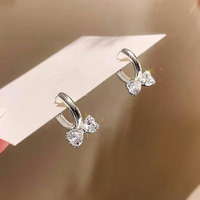 Aretes con diseño de corazón y lazo para mujer, exquisito con incrustaciones de circonita