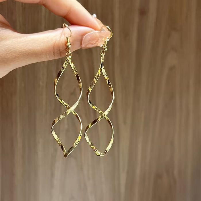 Pendientes de mujer ,diseño individual y original en espiral y onda curva