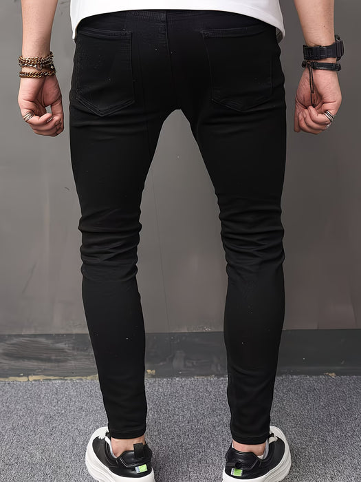 Jeans ajustados elásticos negros para hombre con diseño desgarrado moderno