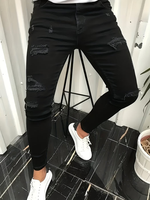 Jeans ajustados elásticos negros para hombre con diseño desgarrado moderno