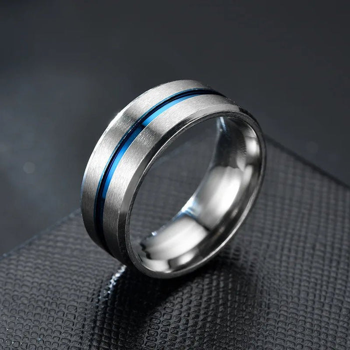 Anillo de acero inoxidable con ranura interior en azul y plateado de superficie - Quierox - Tienda Online