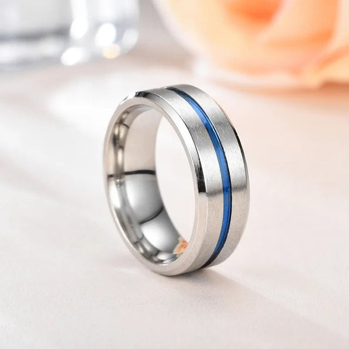 Anillo de acero inoxidable con ranura interior en azul y plateado de superficie - Quierox - Tienda Online