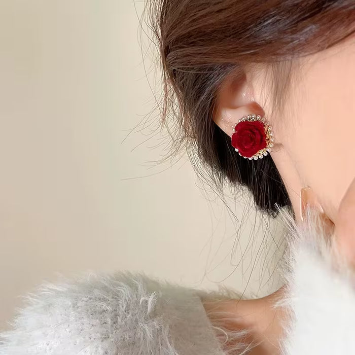 Pendientes Enkara de flor roja afelpados para mujer