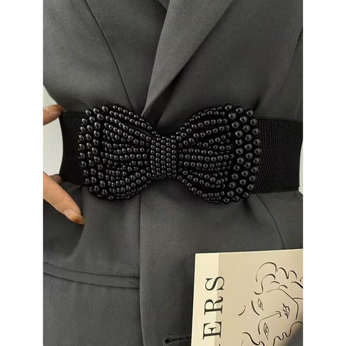 1 cinturón elástico  con lazo adecuado para vestidos, camisas, blusas y faldas