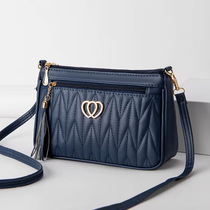 Bolso de hombro elegante, cruzado acolchado con detalle de corazón