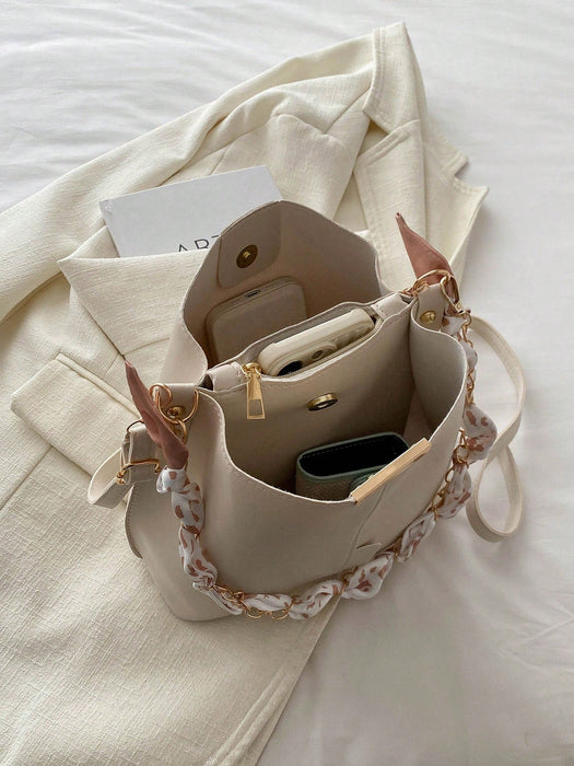 Bolso tipo cubo de piel sintética con detalle de cadena, bandolera para mujer. - Quierox - Tienda Online