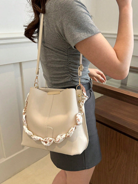 Bolso tipo cubo de piel sintética con detalle de cadena, bandolera para mujer. - Quierox - Tienda Online