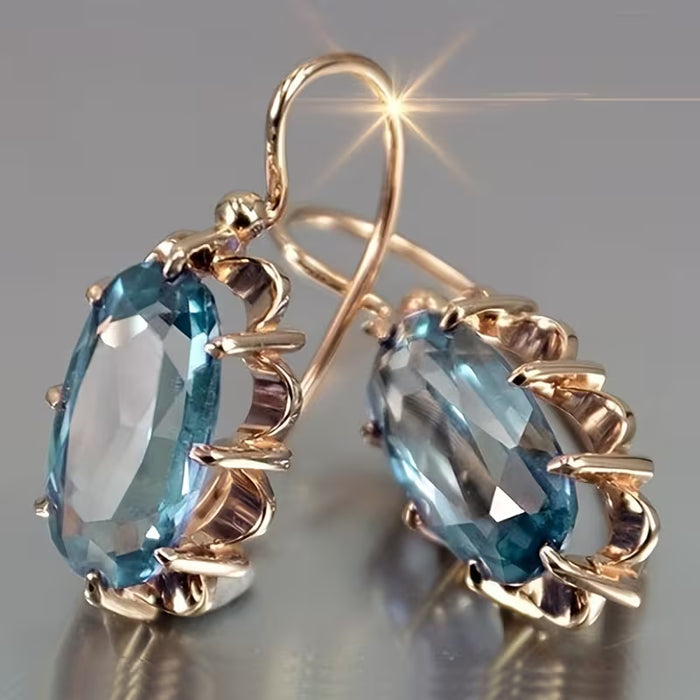 Aretes ovalados con un montaje de garra, perfectos para bodas de novias