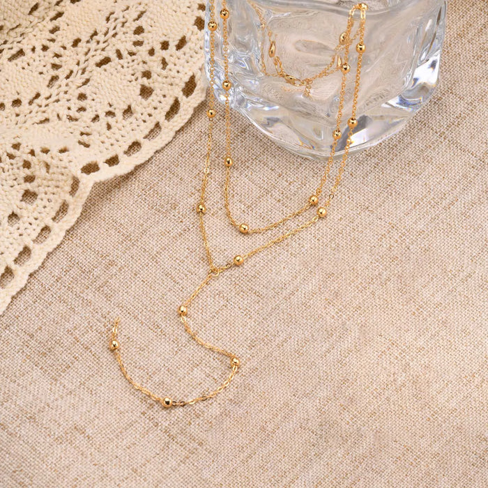 Collar largo en forma de Y para mujer, doble capa, cadena de clavícula delgada con cuentas pequeñas