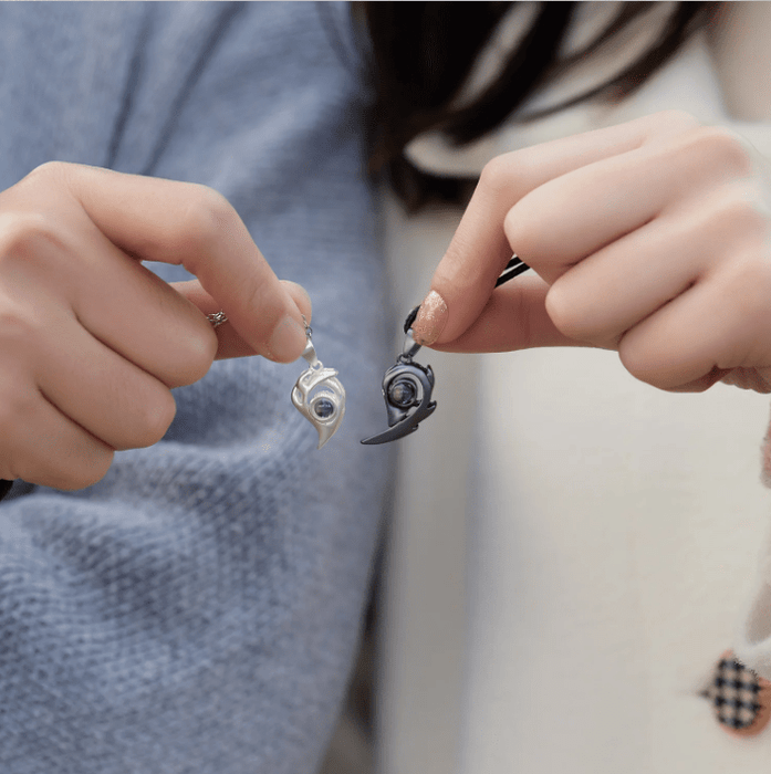 Collar de pareja con corazón magnético de llama de acero inoxidable y titanio - Quierox - Tienda Online