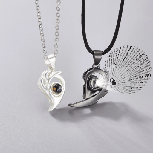 Collar de pareja con corazón magnético de llama de acero inoxidable y titanio - Quierox - Tienda Online